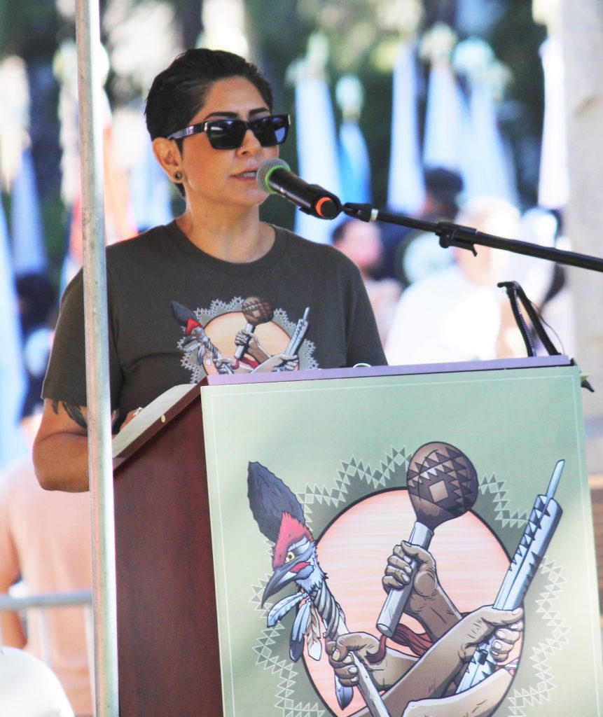 Tribal chairwoman speaks as the master of ceremonies for Native American Day at the Capitol.