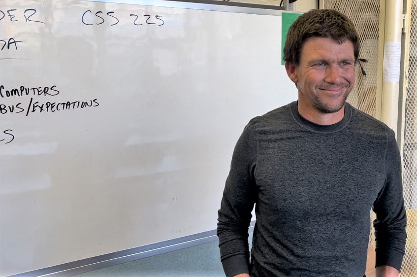 A college professor teaching classes at California Men's Colony.