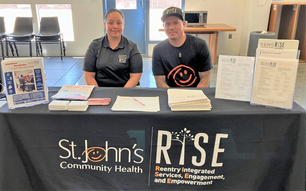 Prerelease fair at RJ Donovan Correctional Facility with St. John's Community Health booth.