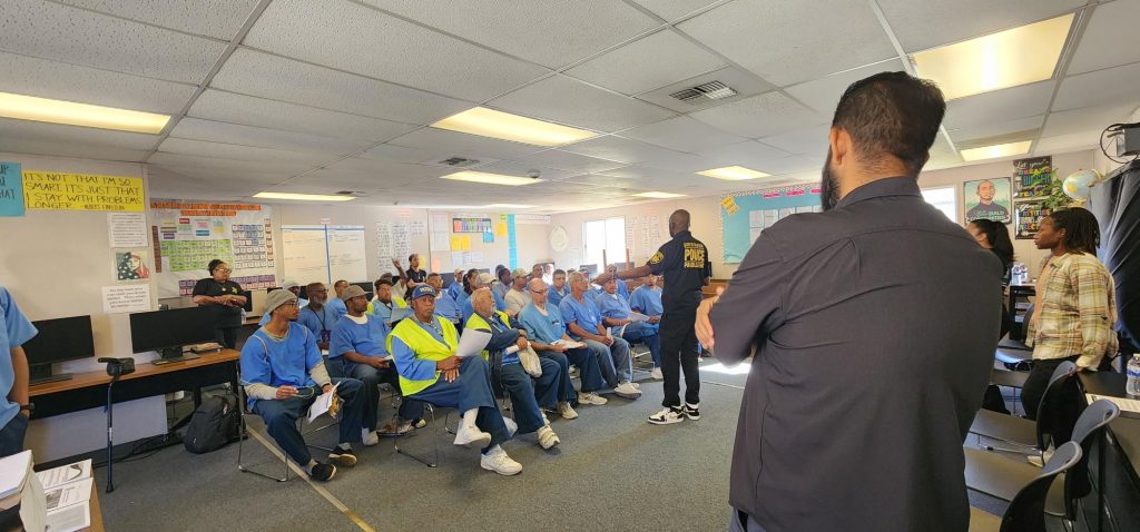 Parole staff answering questions at San Quentin.
