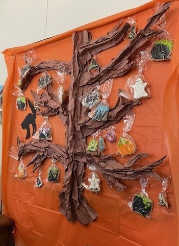 Hand-crafted paper tree with cookies.