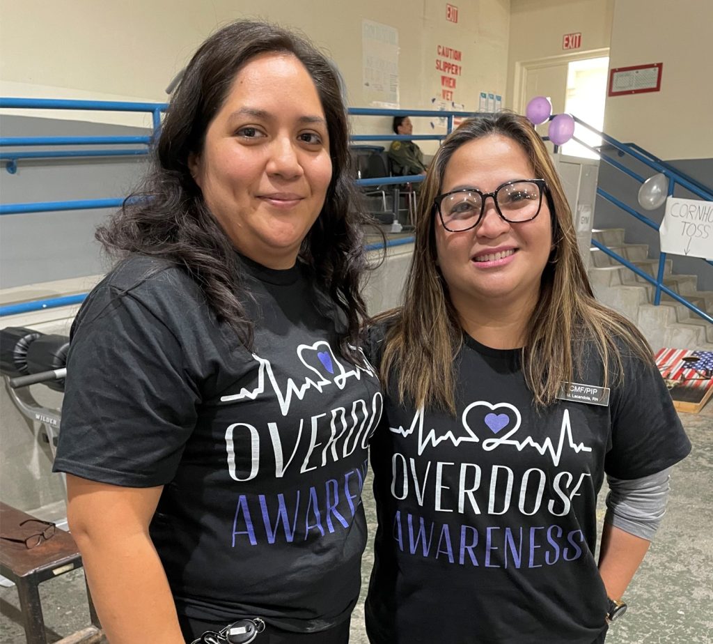 CMF staff wear Overdose Awareness Day t-shirts.