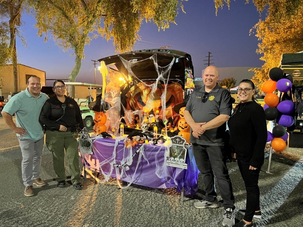 Corcoran prison staff with a decorated trunk.
