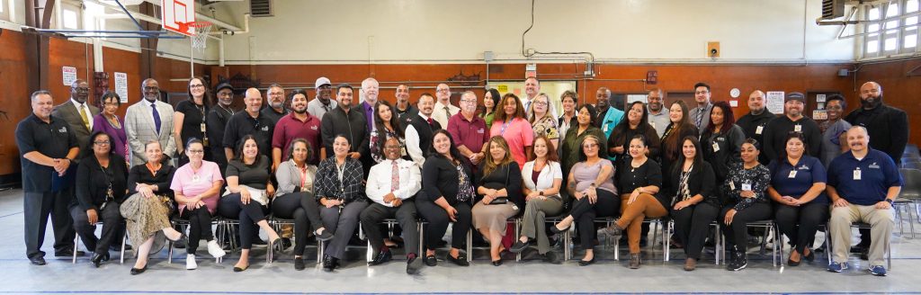 Group photo of reentry resource providers at California Rehabilitation Center, Norco.