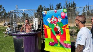 Associate Warden in the dunk tank at the Correctional Training Facility as part of the staff fight against cancer to help find a cure.