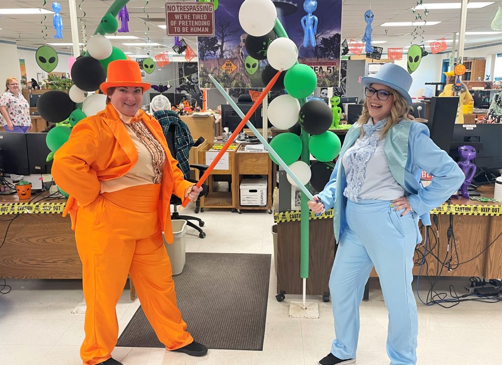 Two costume-wearing staff members at the prison.