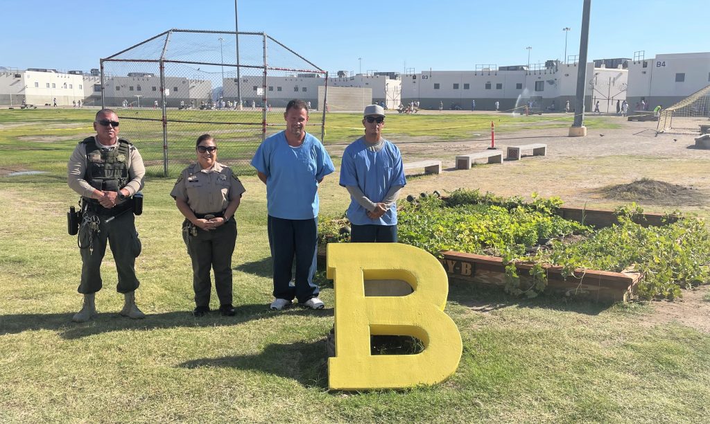 Facility B micro garden at Ironwood State Prison with incarcerated people and staff.