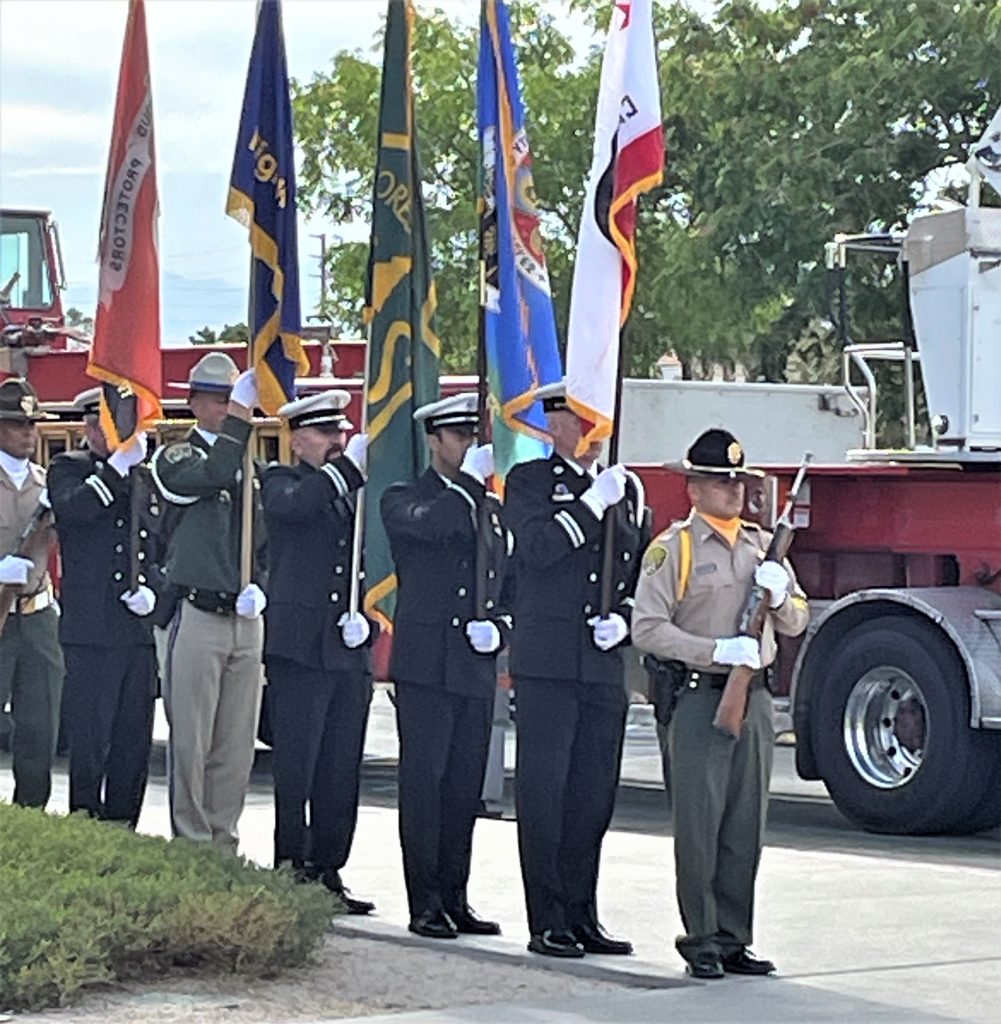 Honor guard with Melendrez in the lead.