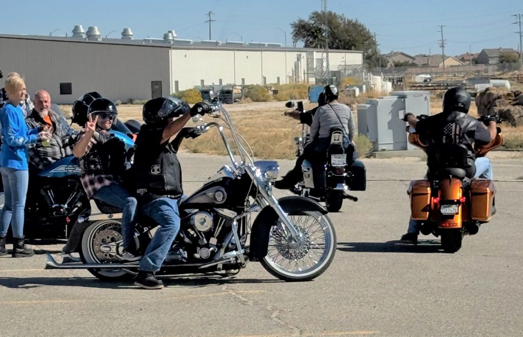 group of people riding motorcycles