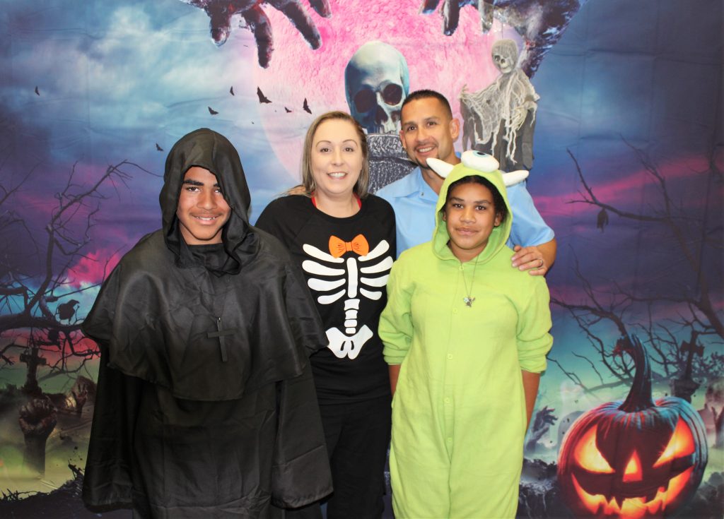 Costumed family members and their incarcerated loved one for Halloween visiting at Mule Creek State Prison in Ione.