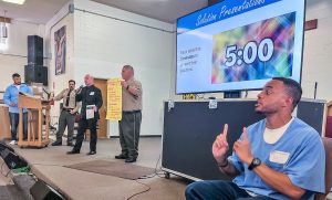 San Quentin Model luncheon with an American sign language interpreter.
