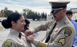 A daughter follows in her dad's career footsteps with CDCR as she graduates the academy.