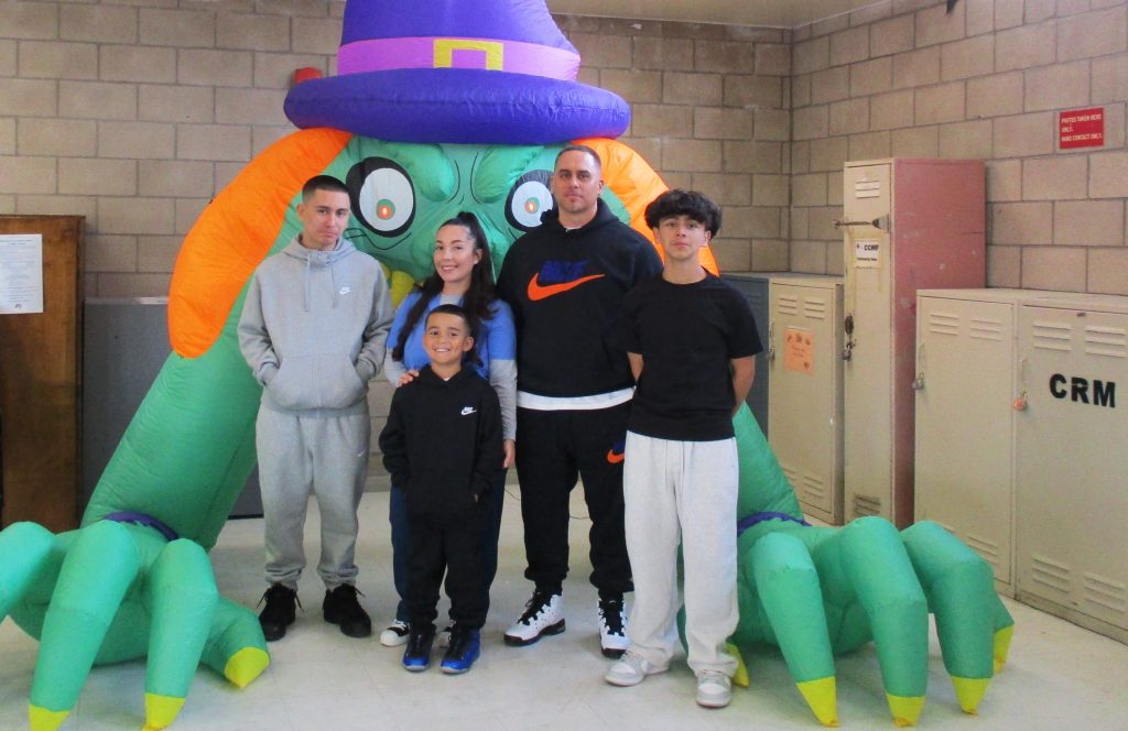 A family visiting their incarcerated loved one.