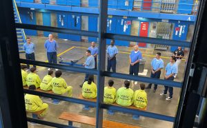 Youth diversion program at California State Prison, Corcoran, with at-risk young people learning about prison life.