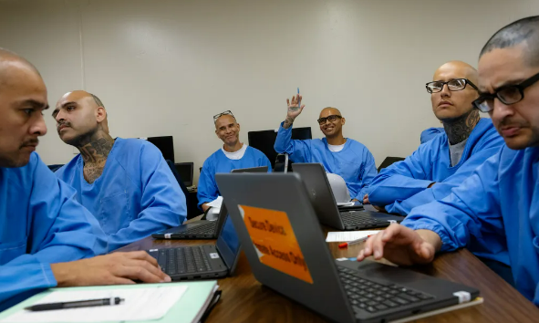 incarcerated studying at table together