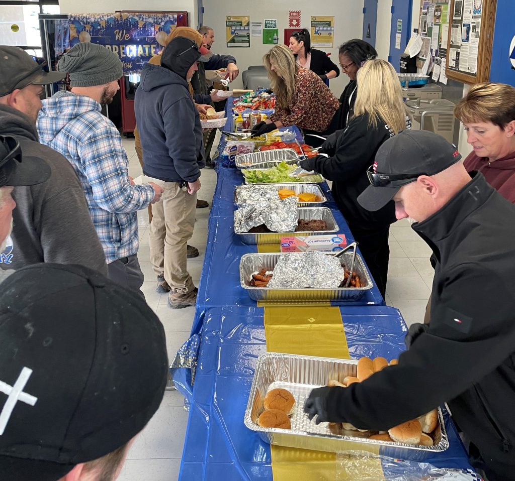staff preparing plates at appreciation day high desert