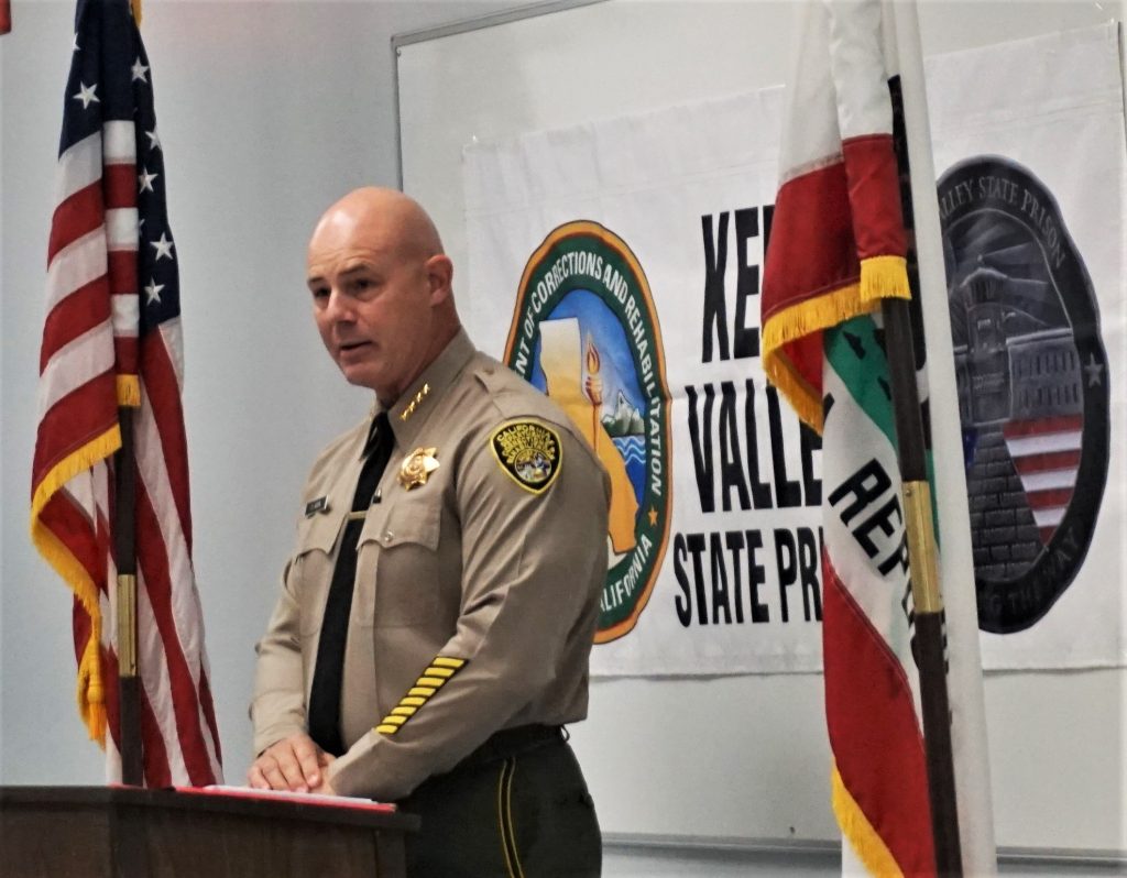 Kern Valley prison Warden Pat Horn speaks during the ceremony.
