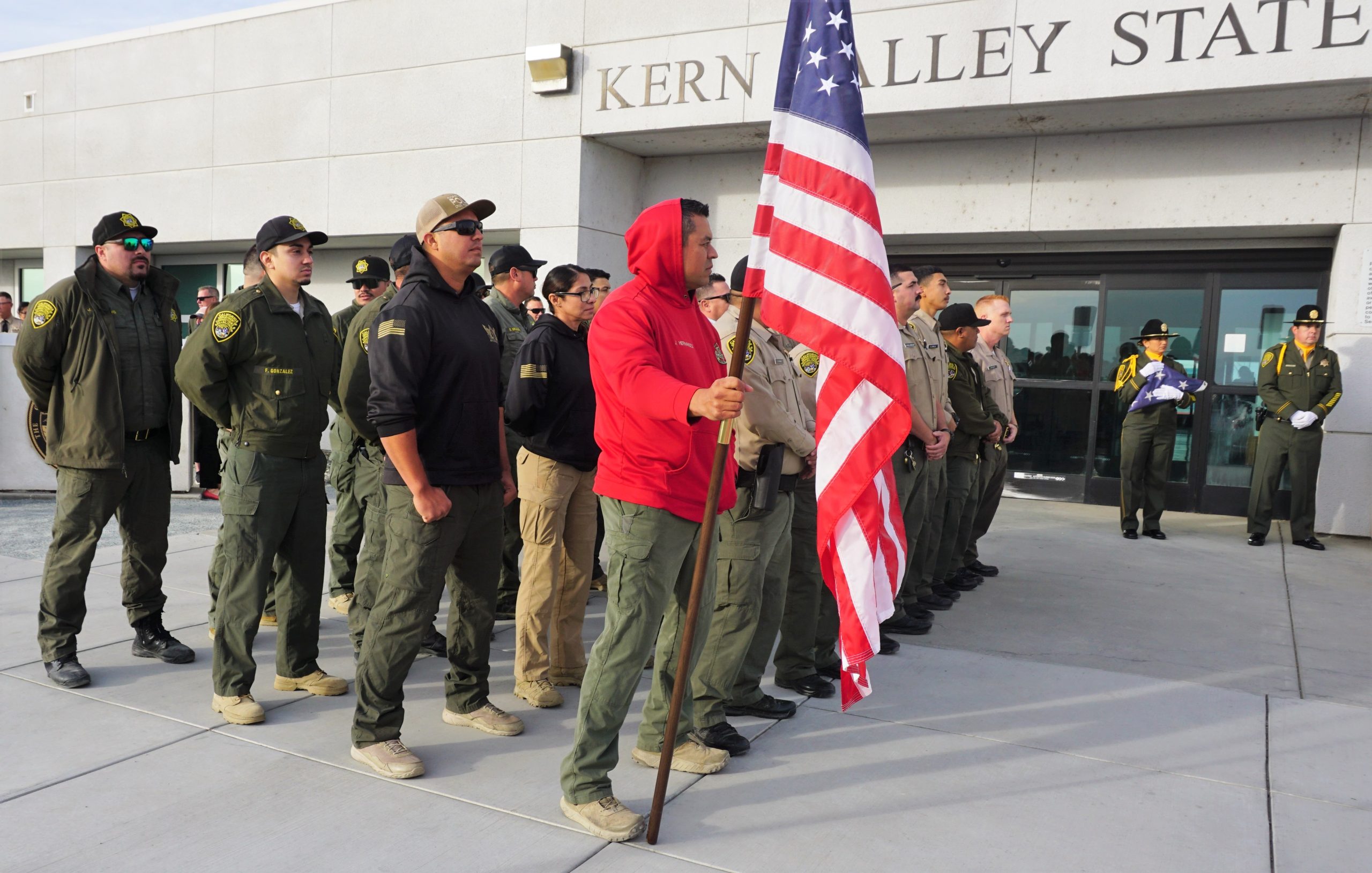 Group photo of people in formation at Kern Valley State Prison.