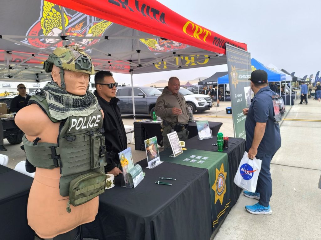 CDCR recruiters reach out to veterans and active miliary at the recruitment booth at the Miramar Airshow.