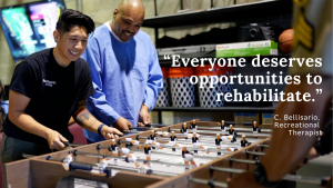Recreational therapist plays a game with an incarcerated person as part of Sac360.