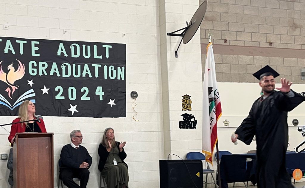 Cheers for graduates at Valley State Prison.