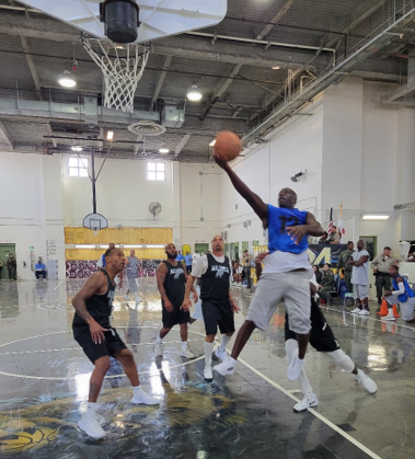 incarcerated person making a layup