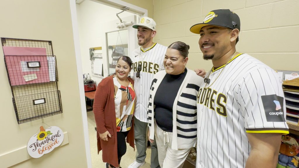 The Padres posed for photos with staff at RJD. 
