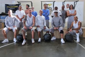 Group photo of Avenal State Prison (ASP) incarcerated people who participant in the Chad 1000X challenge.