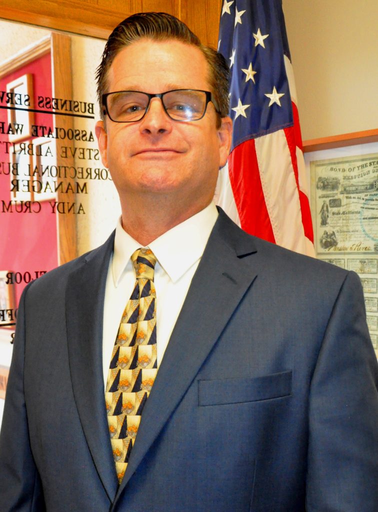 Director Ron Broomfield in a business services office.
