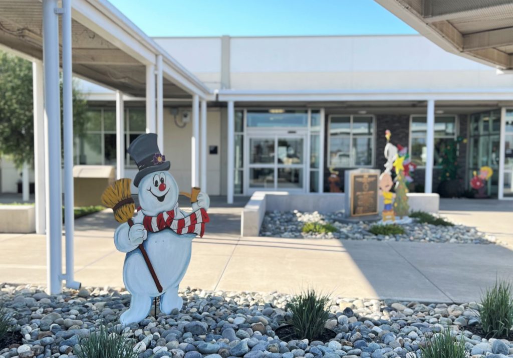 Wood cut-out holiday decorations for California Health Care Facility in Stockton.