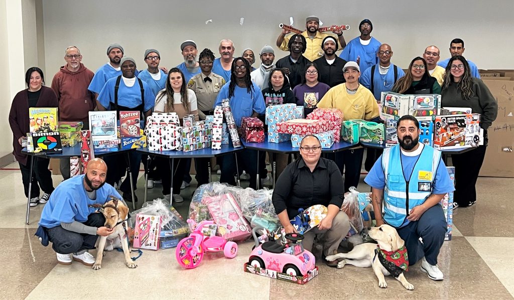 Group photo of wrapping presents at CHCF.