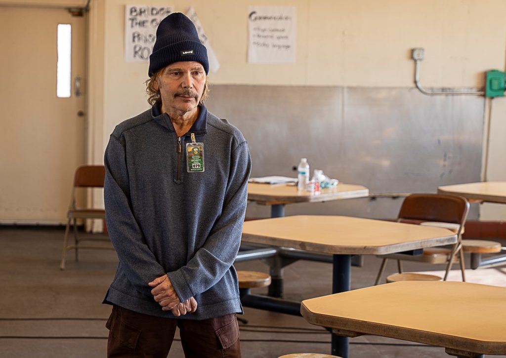 Glassman speaks to people at CIM.