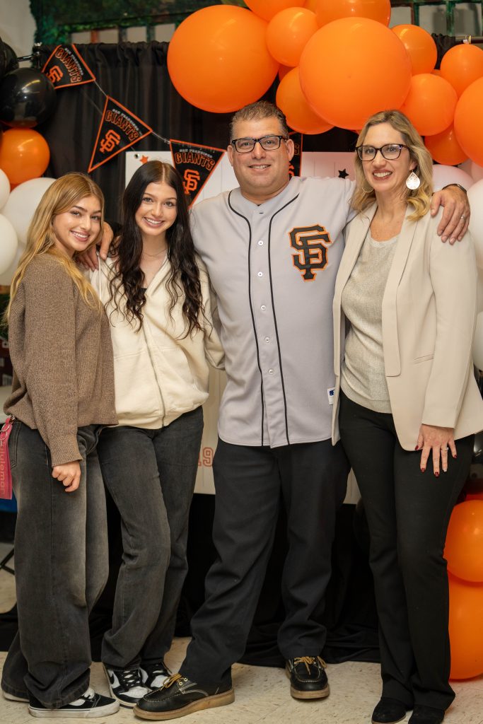 The warden and his wife with their daughters at CMF.