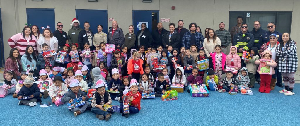 CDCR and City of Corcoran staff with kids.