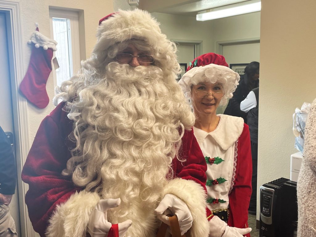 Santa and Mrs. Claus from High Desert State Prison delivering gifts to seniors in Susanville.