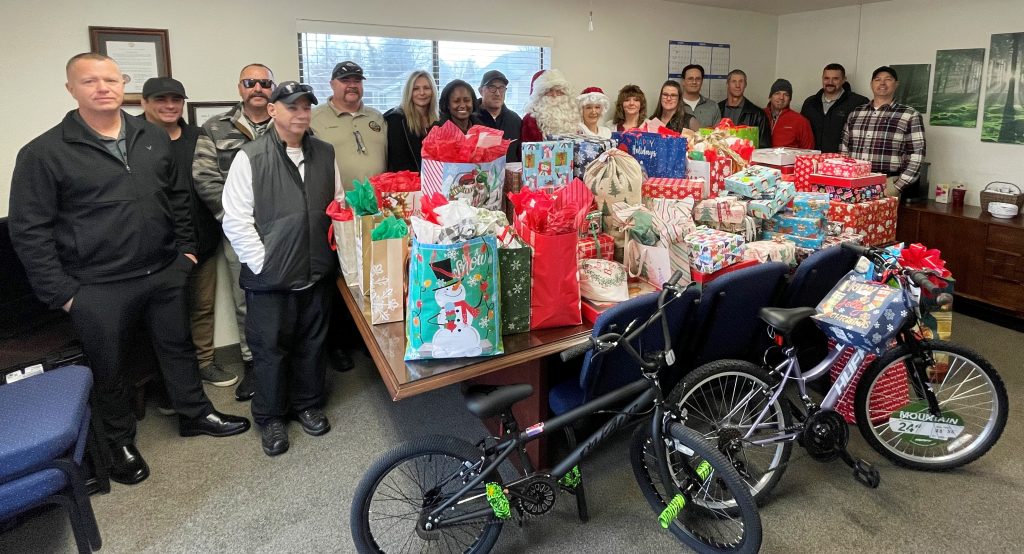 High Desert staff with gifts for children.