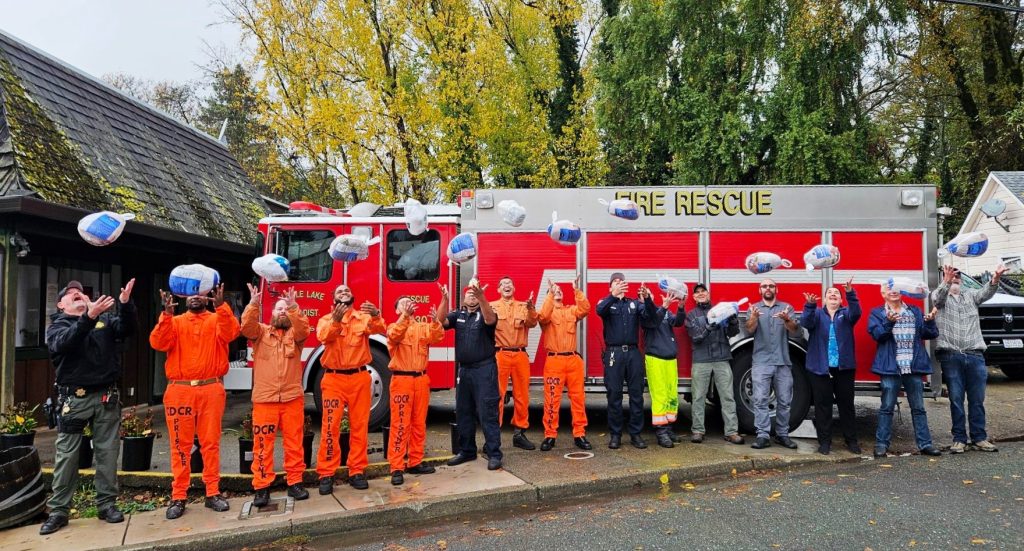 Staff and the incarcerated at Parlin Fork Conservation Camp take part in the turkey toss to fight hunger.