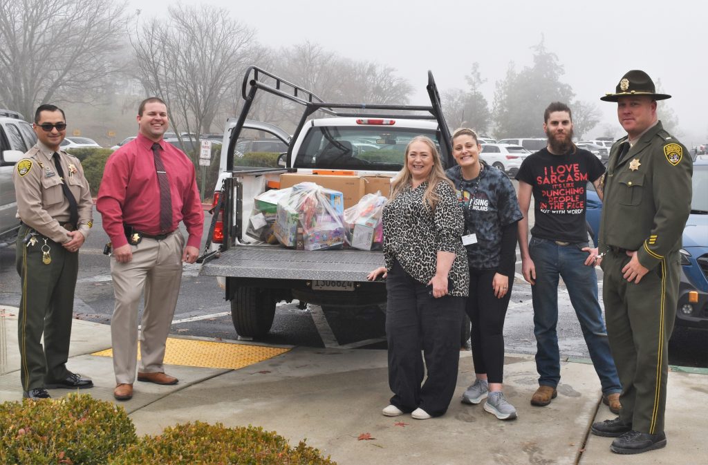 SCC staff with donations.