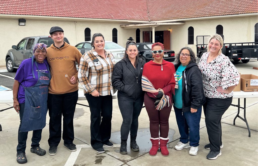 Valley State Prison staff and volunteers prepare to distribute Thanksgiving meals. 