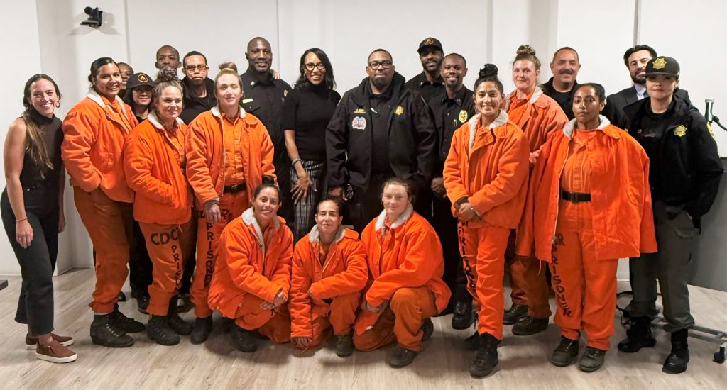 Group photo of camp participants, staff and volunteers at the film screening.