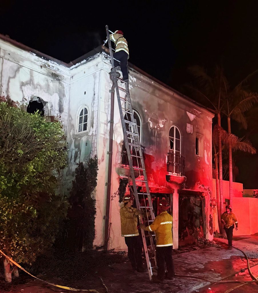 Strike team members fighting a structure fire in Los Angeles area.