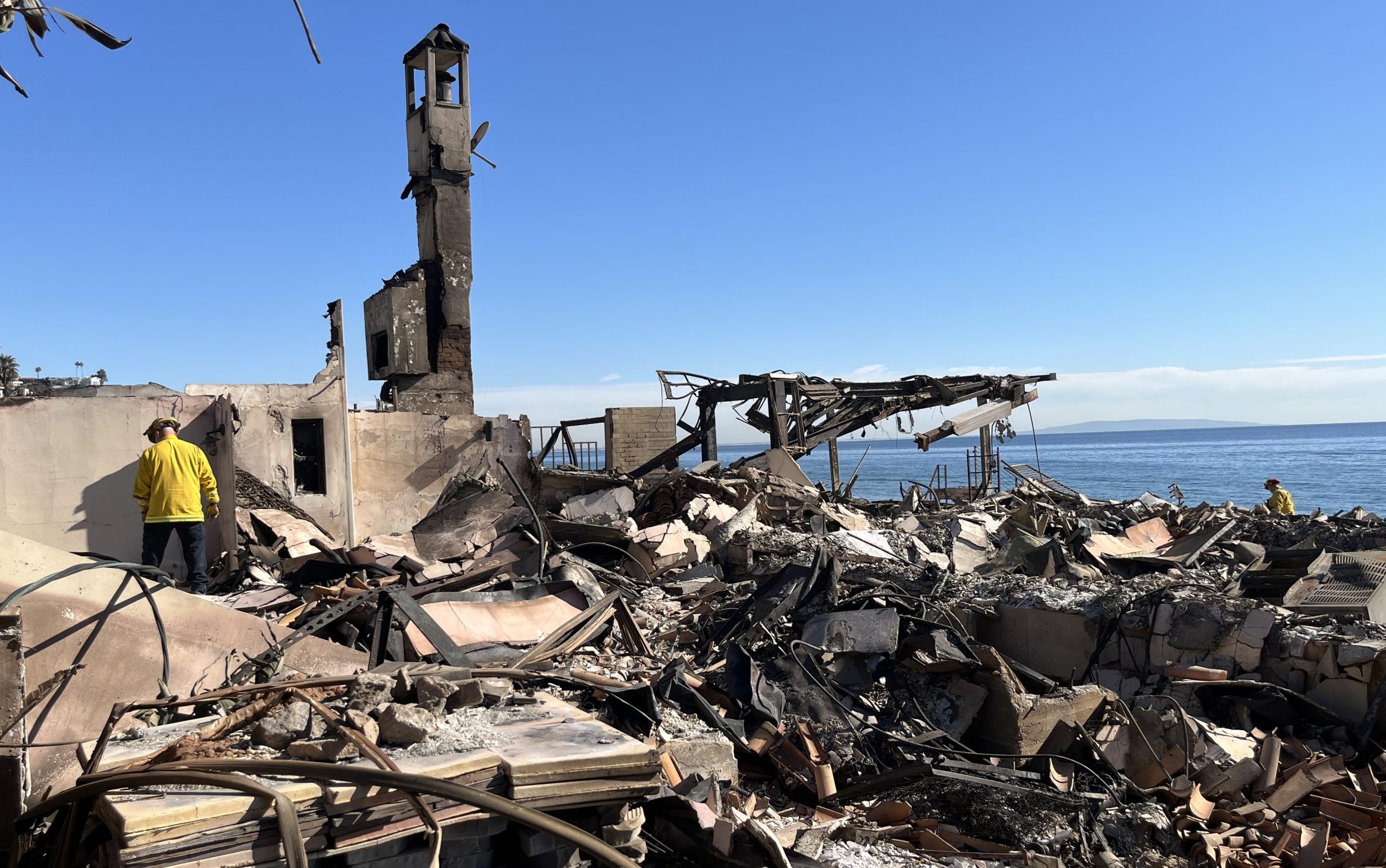 Strike team members from CDCR search through the rubble in the Palisades, searching for hotspots while helping survivors.