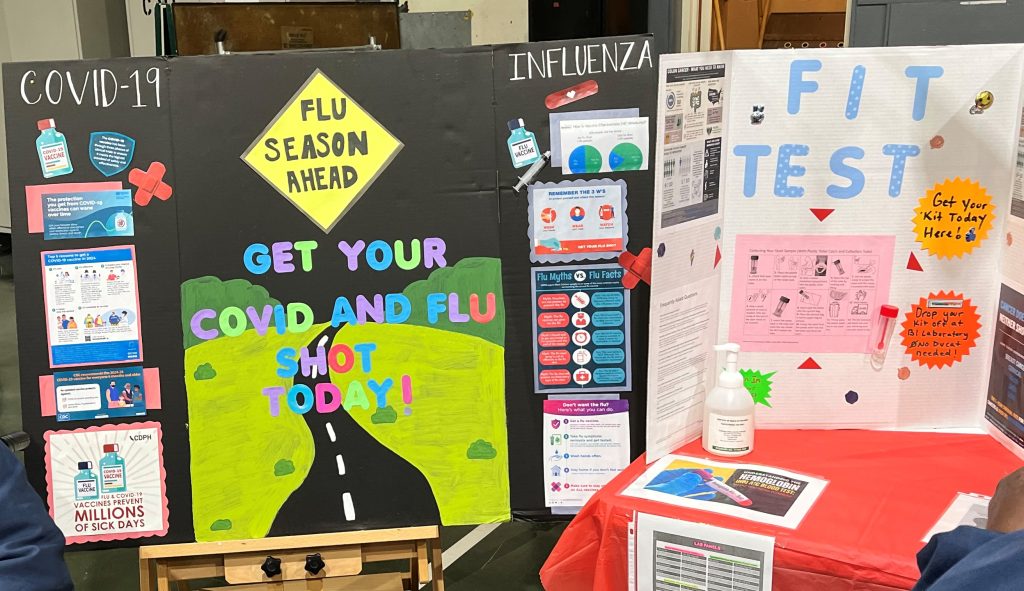 Vaccination information booth at CMF.