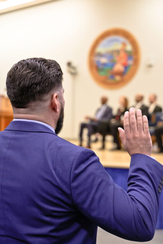 New parole agent being sworn in at the January 2025 academy graduation.