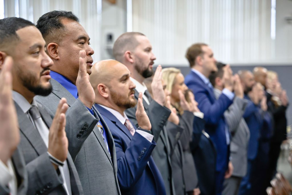 Swearing in new parole agents.