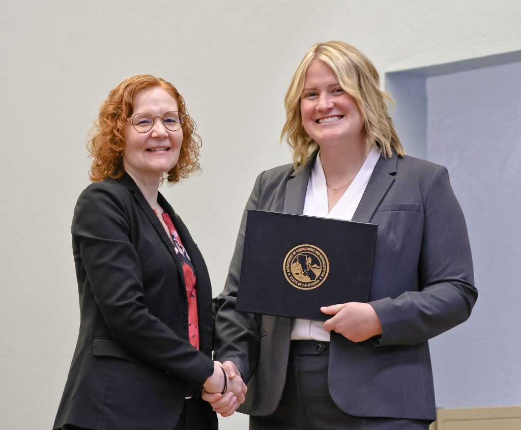 Heather Bowlds with new parole agent.