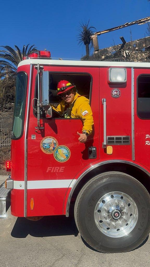 CDCR Firefighter in a firetruck for Week in Review for January 17.