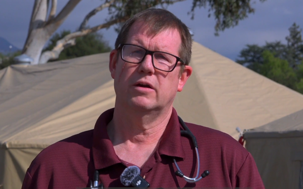 CDCR Medical Emergency Response Team doctor discussing fire response efforts.