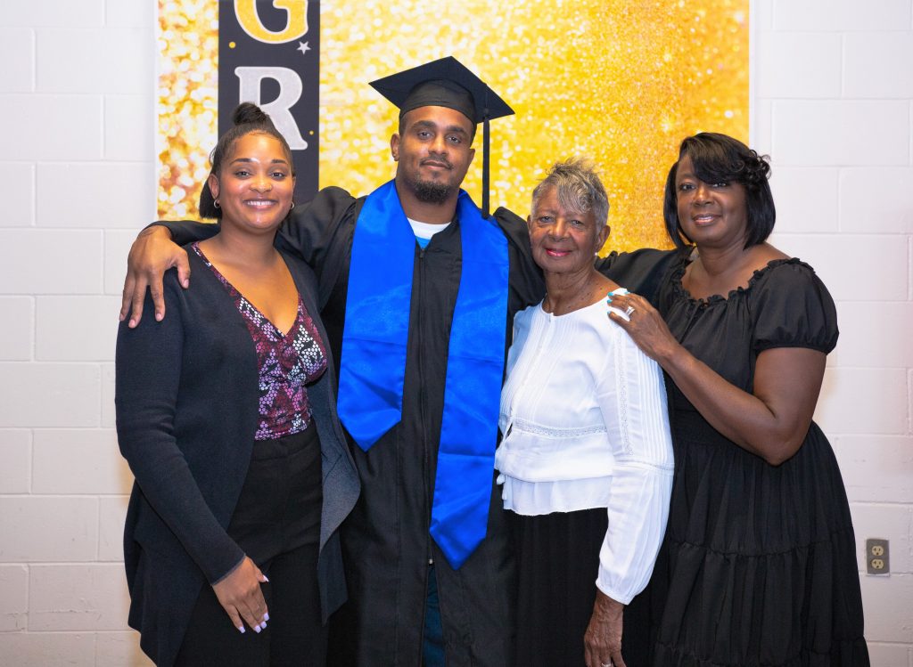 Families celebrating their graduates at North kern State Prison.