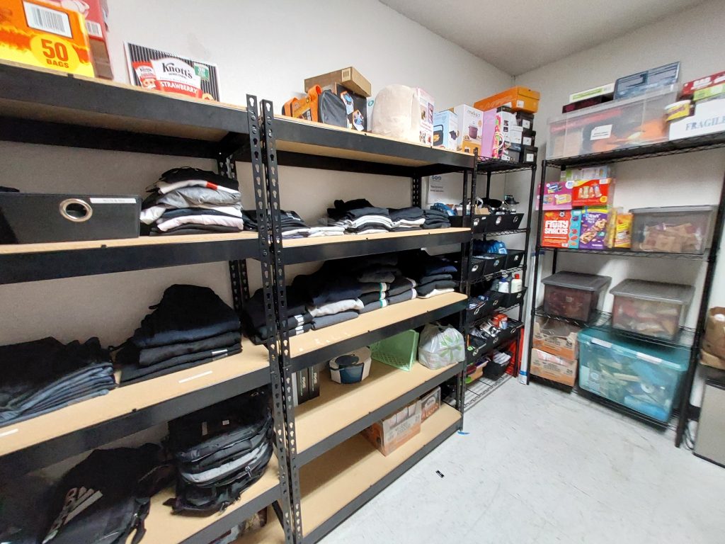 Clothing and hygiene products on shelves